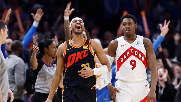 Feb 4, 2024; Oklahoma City, Oklahoma, USA; Oklahoma City Thunder guard Aaron Wiggins (21) celebrates after scoring a three point basket against the Toronto Raptors during overtime at Paycom Center.